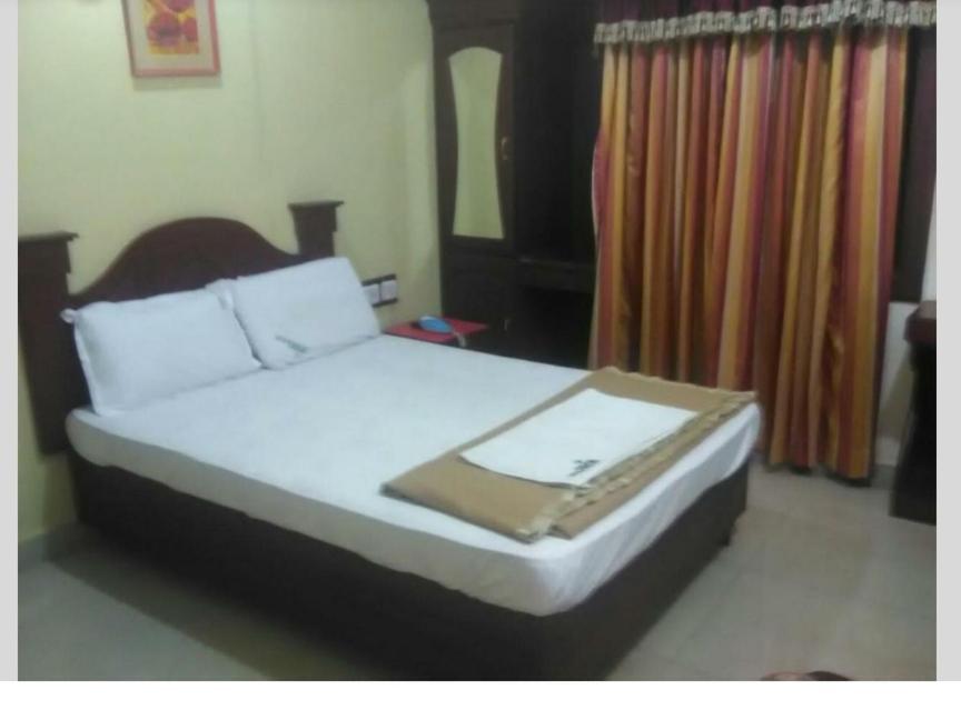 Hotel Priya Chengannur Szoba fotó